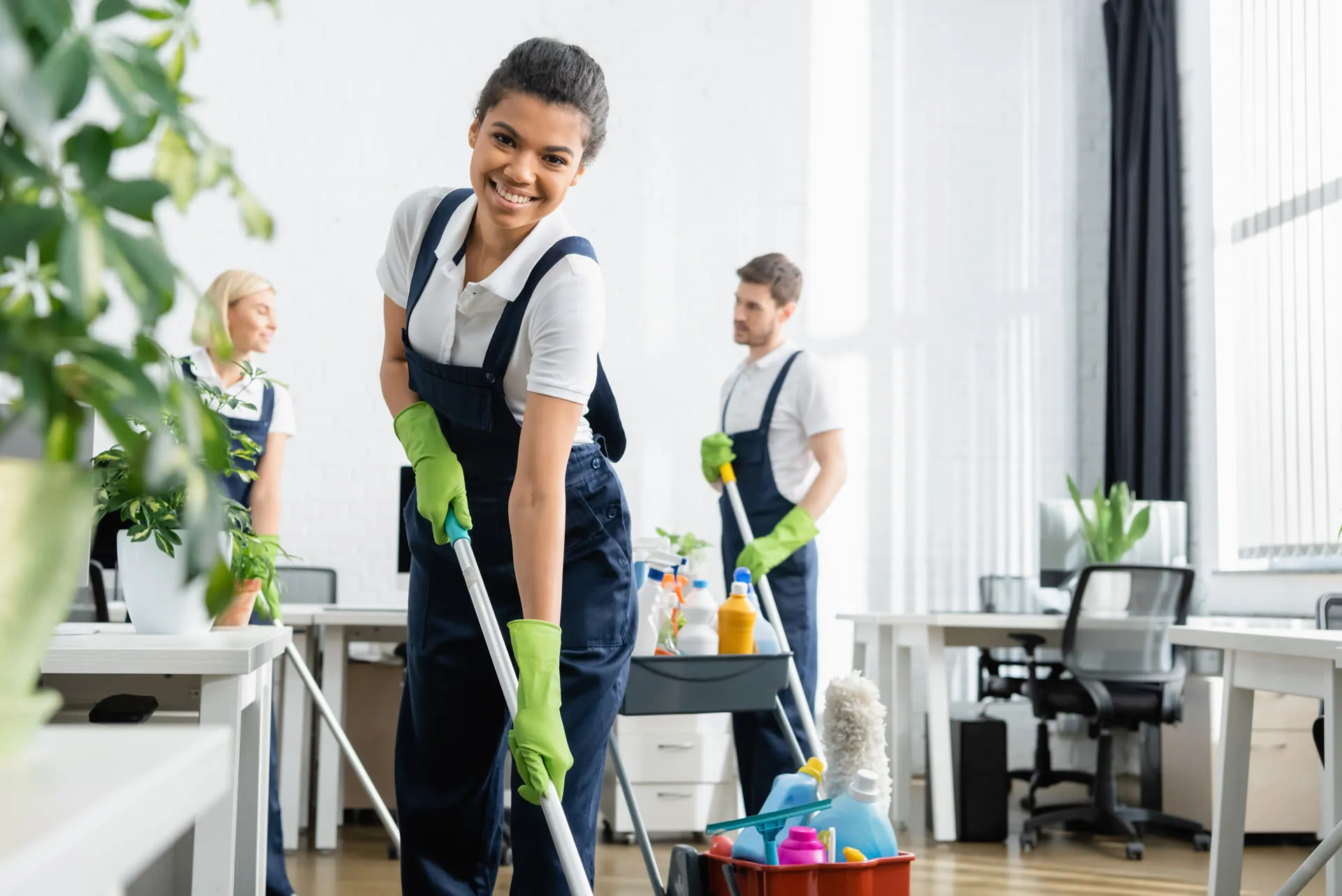 A Glō team member cleaning an office